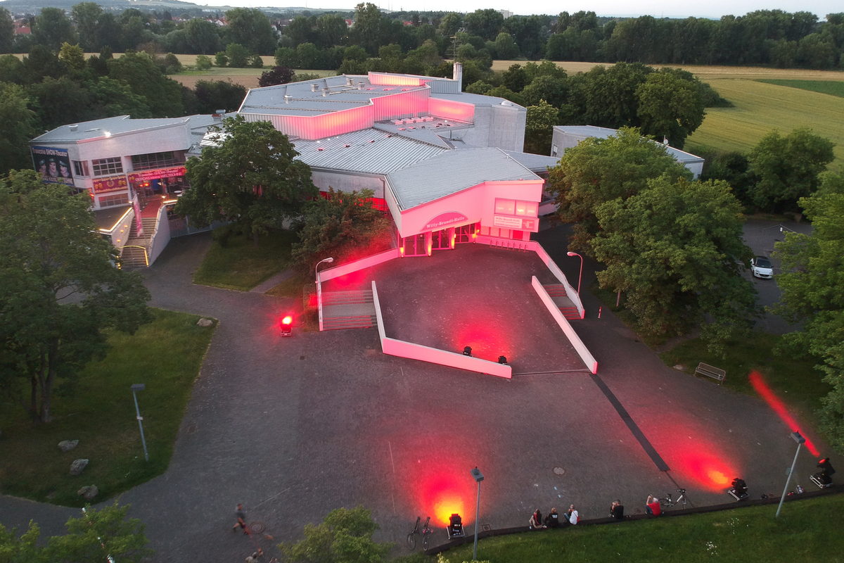 The Willy-Brandt-Halle in Mühlheim am Main seen from the air in the evening