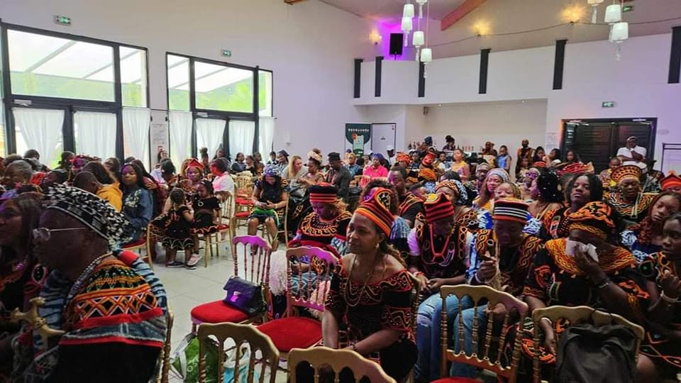 WICUDA members in Toghu attire filling a European convention hall